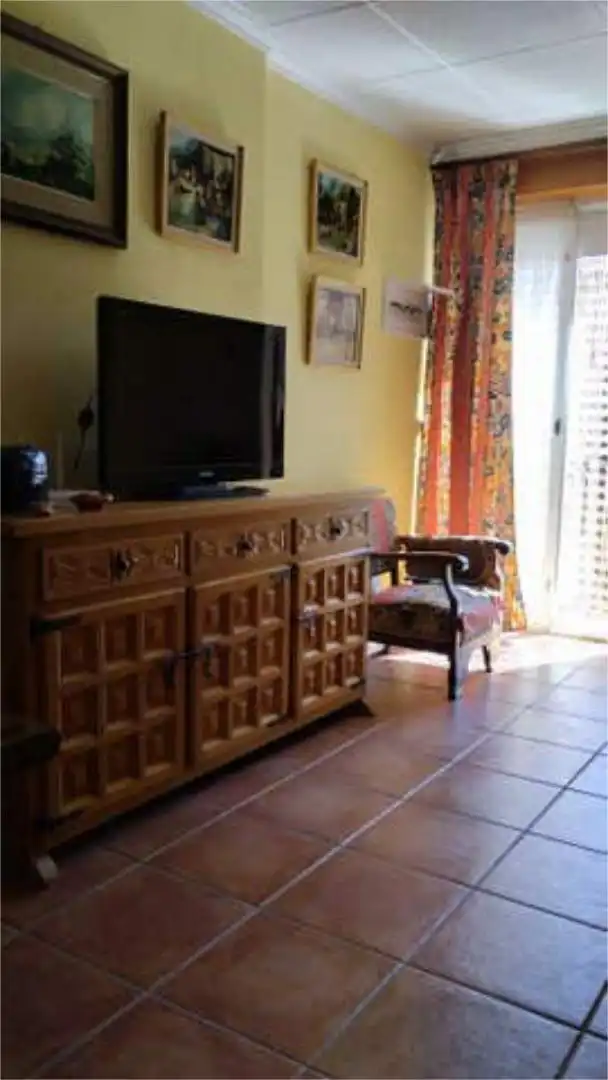 Casa adosada de alquiler en Campoamor Sala de estar de Casa adosada de alquiler en Orihuela con Jardín privado y Piscina