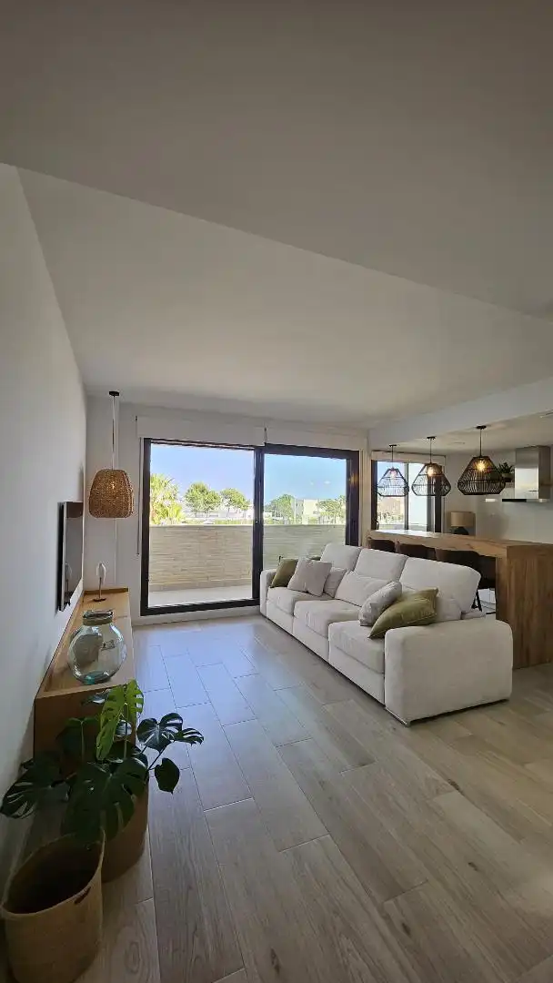 Pis en venda a Carrer Margalló, 3, Roques Daurades - L'Estany Sala d'estar de Pis en venda en L'Ametlla de Mar amb Aire condicionat, Calefacció i Terrassa