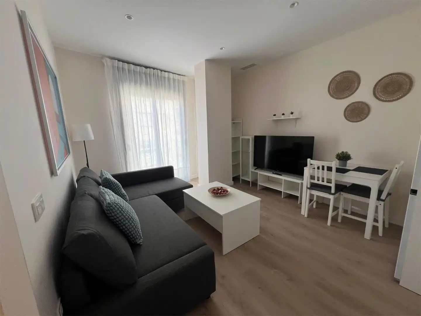 Sala de estar de Piso de alquiler en  Almería Capital con Aire acondicionado, Calefacción y Amueblado