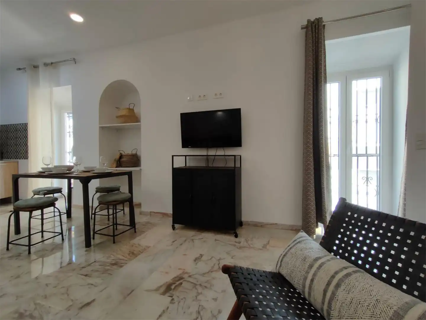 Sala de estar de Casa adosada en venta en  Sevilla Capital con Aire acondicionado y Balcón