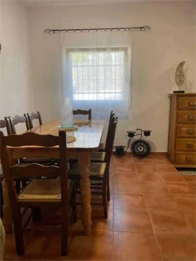 Casa adosada de alquiler en La Coquina Comedor de Casa adosada de alquiler en Chiclana de la Frontera con Calefacción, Jardín privado y Terraza