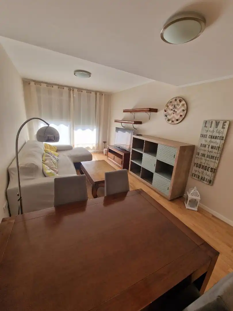 Living room of Flat for rent in Mairena del Aljarafe  with Heating, Private garden and Parquet flooring