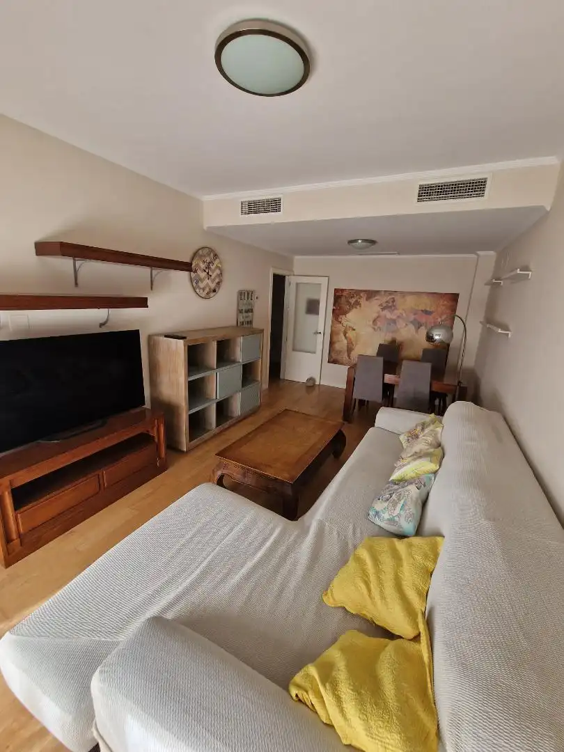 Living room of Flat for rent in Mairena del Aljarafe  with Heating, Private garden and Parquet flooring