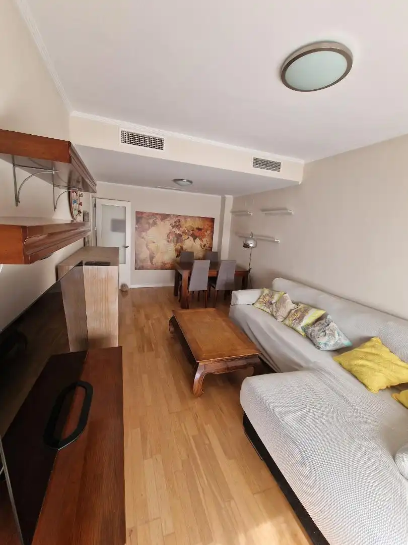 Living room of Flat for rent in Mairena del Aljarafe  with Heating, Private garden and Parquet flooring