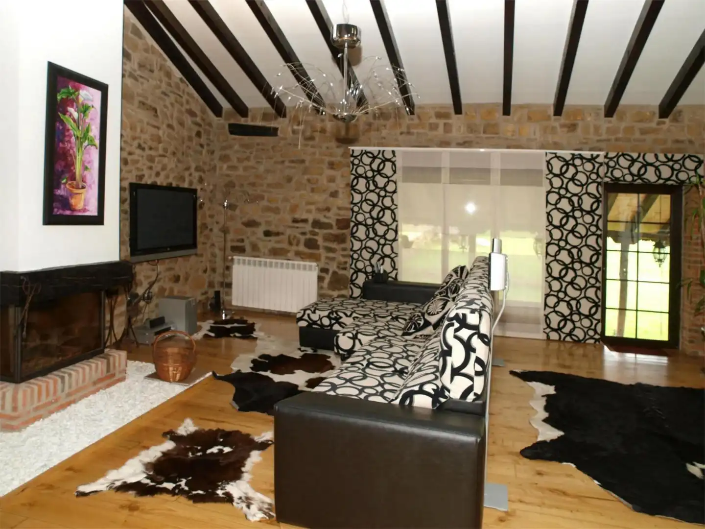 Sala de estar de Casa adosada en venta en Arenas de Iguña con Calefacción, Jardín privado y Parquet