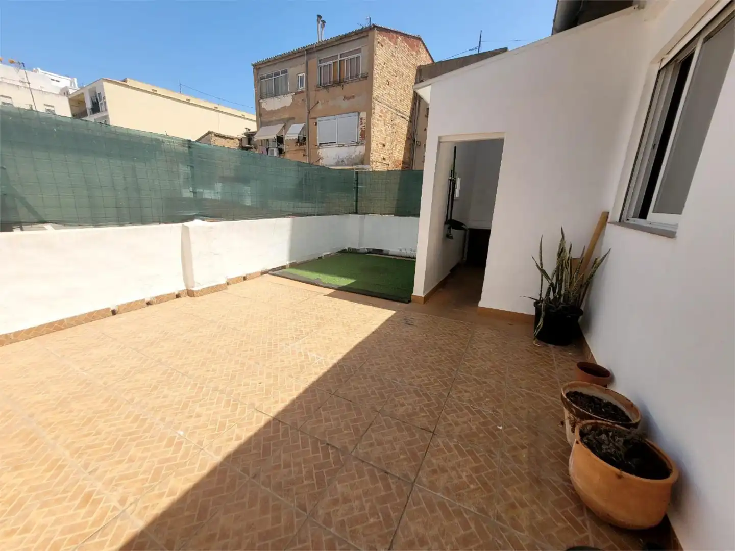 Casa adosada en venda a Avinguda de Beniopa, 46, Plaza Elíptica - República Argentina Terrassa de Casa adosada en venda en Gandia amb Terrassa i Traster