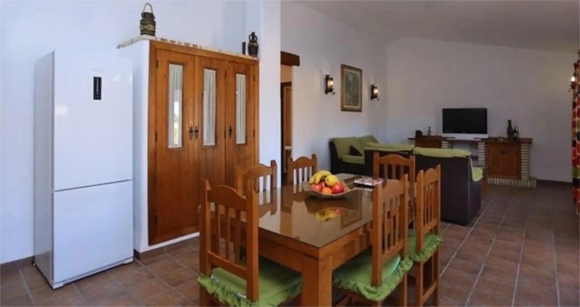 Casa adosada de alquiler en Roche Comedor de Casa adosada de alquiler en Conil de la Frontera con Calefacción, Jardín privado y Terraza