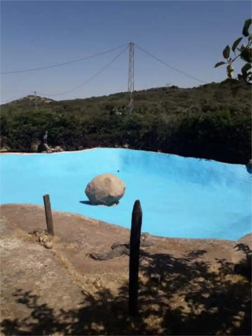 Casa adosada en venta en Segura de León Piscina de Casa adosada en venta en Segura de León con Calefacción, Jardín privado y Terraza