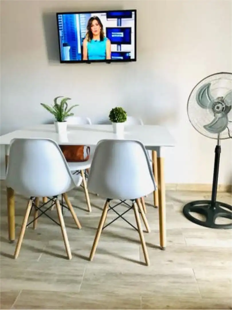 Apartamento de alquiler en Golf - Torre Almenara Comedor de Apartamento de alquiler en Almonte con Jardín privado, Terraza y Piscina