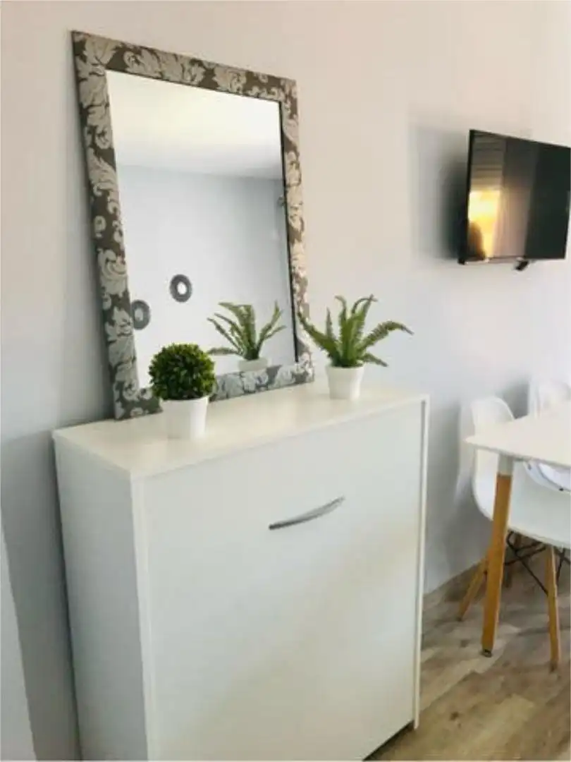 Apartamento de alquiler en Golf - Torre Almenara Habitación de Apartamento de alquiler en Almonte con Jardín privado, Terraza y Piscina