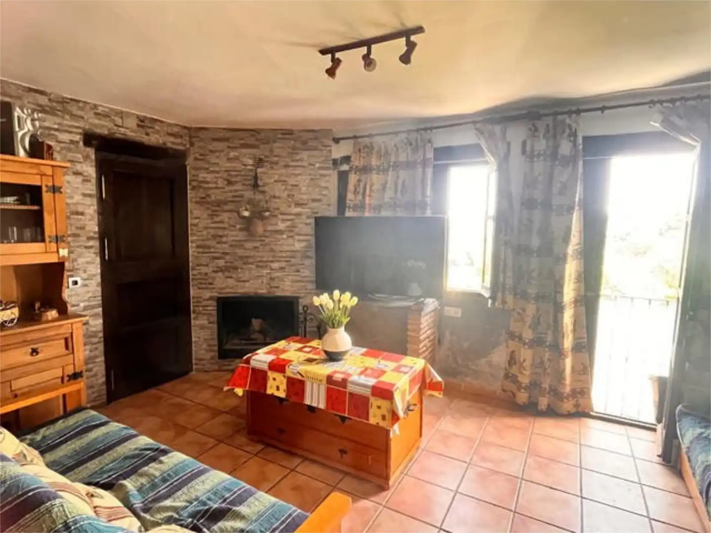 Sala d'estar de Apartament en venda en Alpujarra de la Sierra amb Calefacció, Jardí privat i Moblat