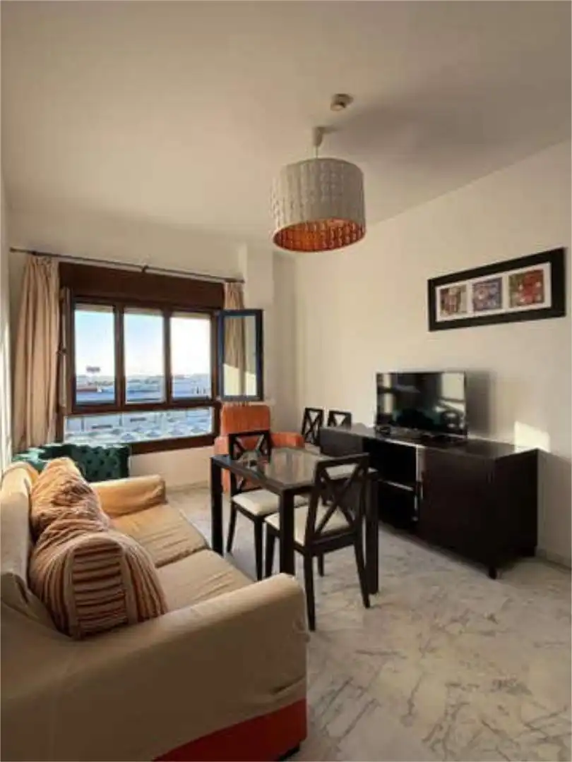 Wohnzimmer von Wohnung zum Verkauf in Bormujos mit Heizung, Privatgarten und Schwimmbad