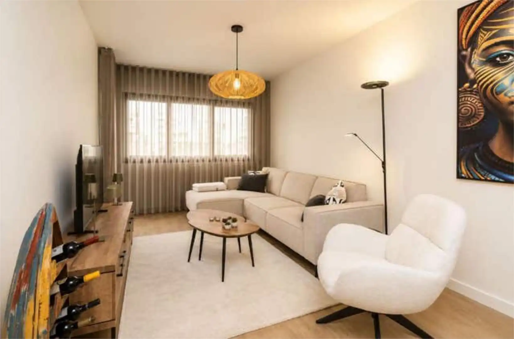 Wohnung zum Verkauf in Los Castillejos - La Trinidad Wohnzimmer von Wohnung zum Verkauf in Málaga mit Privatgarten, Terrasse und Abstellraum