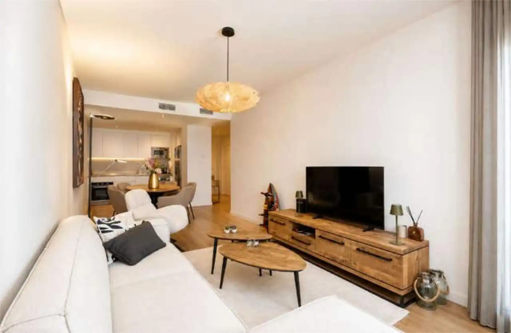 Wohnung zum Verkauf in Los Castillejos - La Trinidad Wohnzimmer von Wohnung zum Verkauf in Málaga mit Privatgarten, Terrasse und Abstellraum