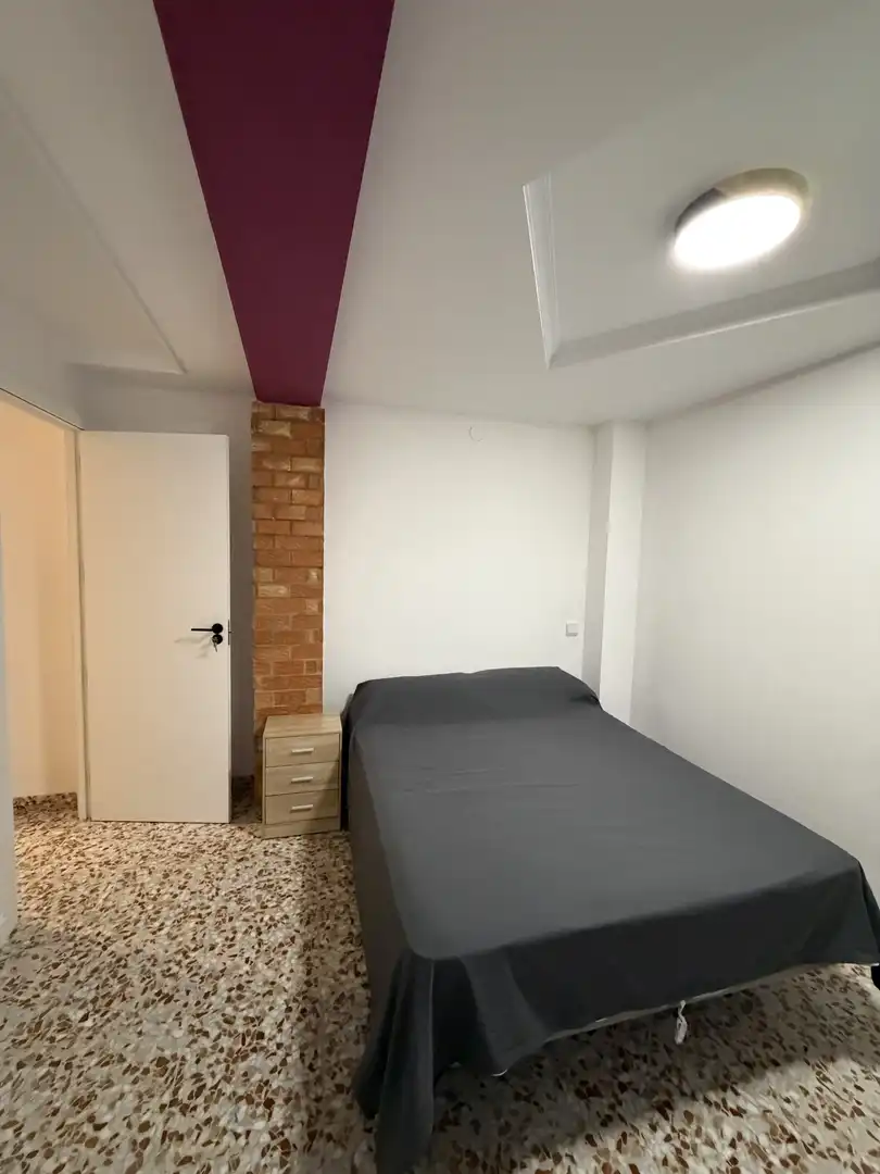 Room in Carrer d'Oliva, 16, La Font d'en Carròs Bedroom of Flat for share in La Font d'en Carròs with Air Conditioner, Heating and Storage room