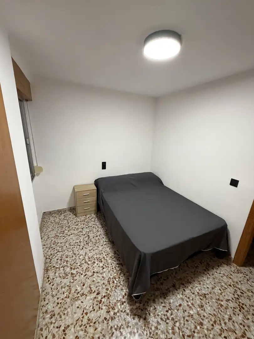 Room in Carrer d'Oliva, 16, La Font d'en Carròs Bedroom of Flat for share in La Font d'en Carròs with Air Conditioner, Heating and Storage room