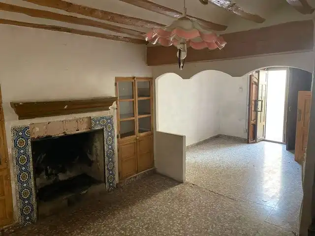 Sala d'estar de Casa adosada en venda en Mula