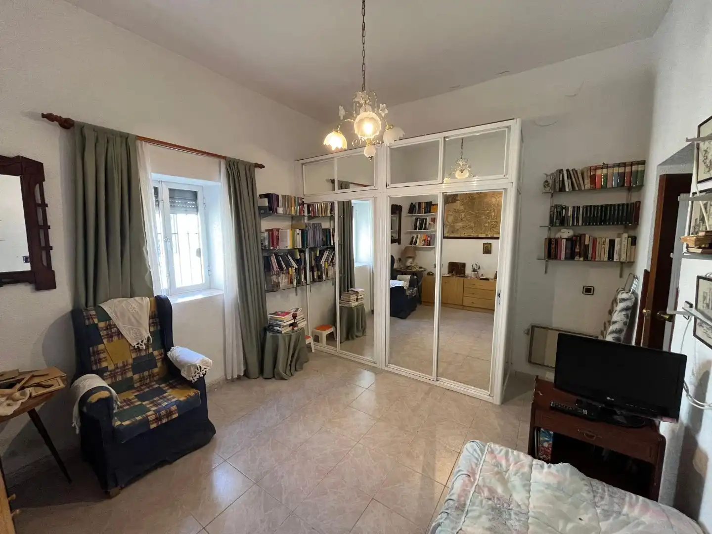 Casa adosada en venta en Plaza Cante Jondo, 1, La Zarzuela - San José - Belén Sala de estar de Casa adosada en venta en Linares con Aire acondicionado, Terraza y Trastero