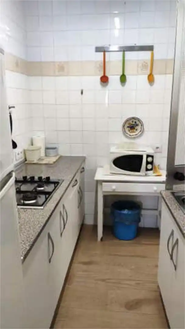 Wohnung zur Miete in Centro - Torre de la Higuera Küche von Wohnung zur Miete in Almonte mit Privatgarten, Terrasse und Schwimmbad