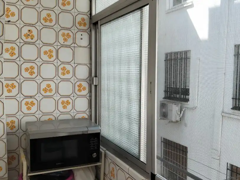 Flat for sale in Calle Ciudad de Játiva, 2, Parque Alcosa Balcony of Flat for sale in Sevilla Capital with Air Conditioner and Balcony