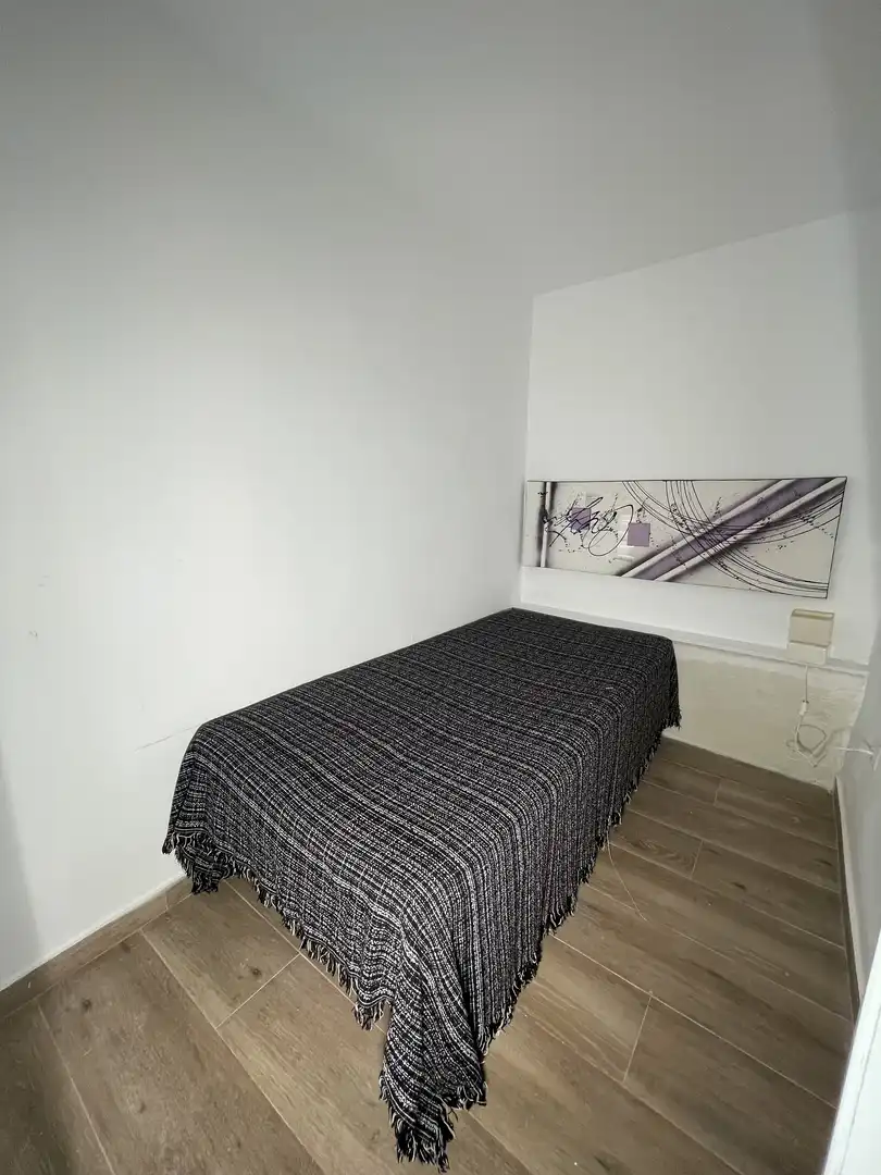 Casa adosada de lloguer a Avenida del Ferrocarril, 10, San Martín de Valdeiglesias Dormitori de Casa adosada de lloguer en San Martín de Valdeiglesias amb Calefacció, Parquet i Terrassa