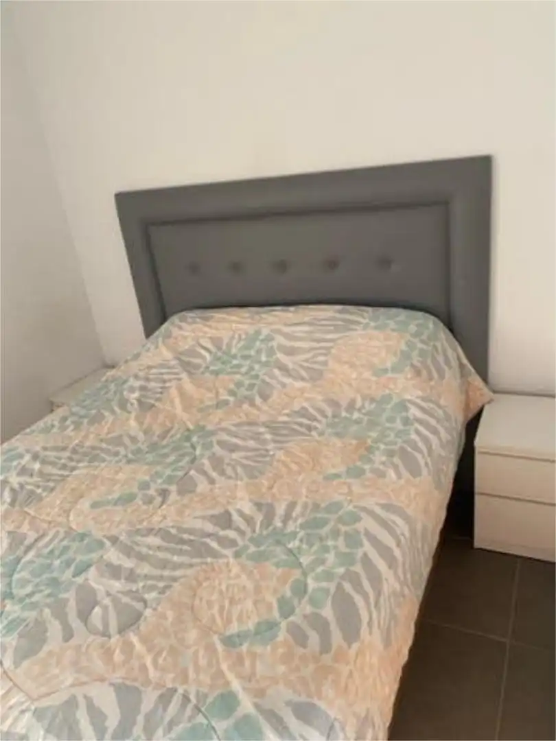 Dormitori de Apartament de lloguer en Almería amb Jardí privat, Terrassa i Piscina