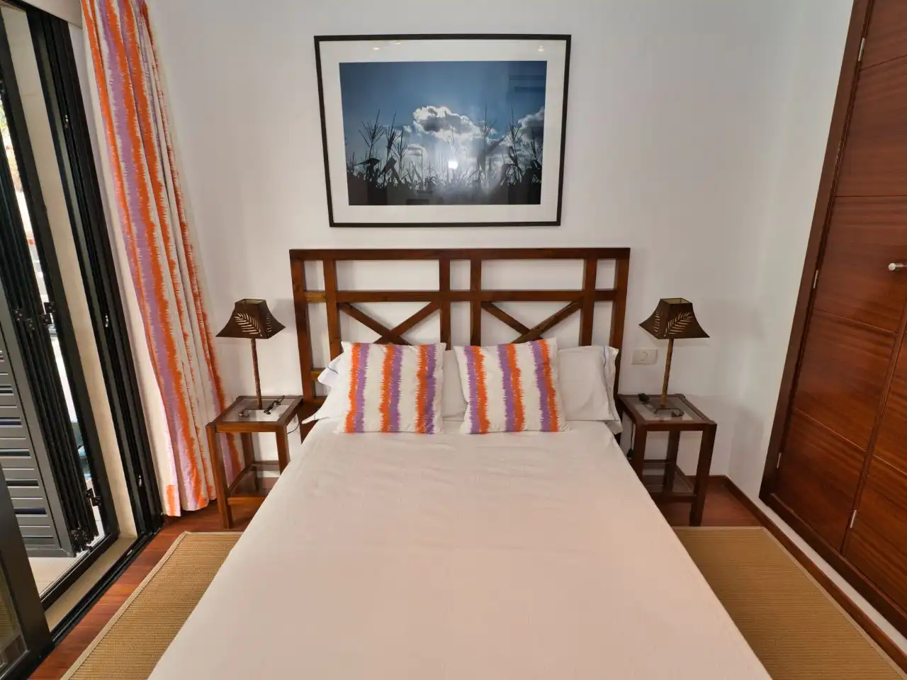 Wohnung zur Miete in Avenida Francia, 19, La Caldera Schlafzimmer von Wohnung zur Miete in Adeje mit Klimaanlage, Privatgarten und Parkett