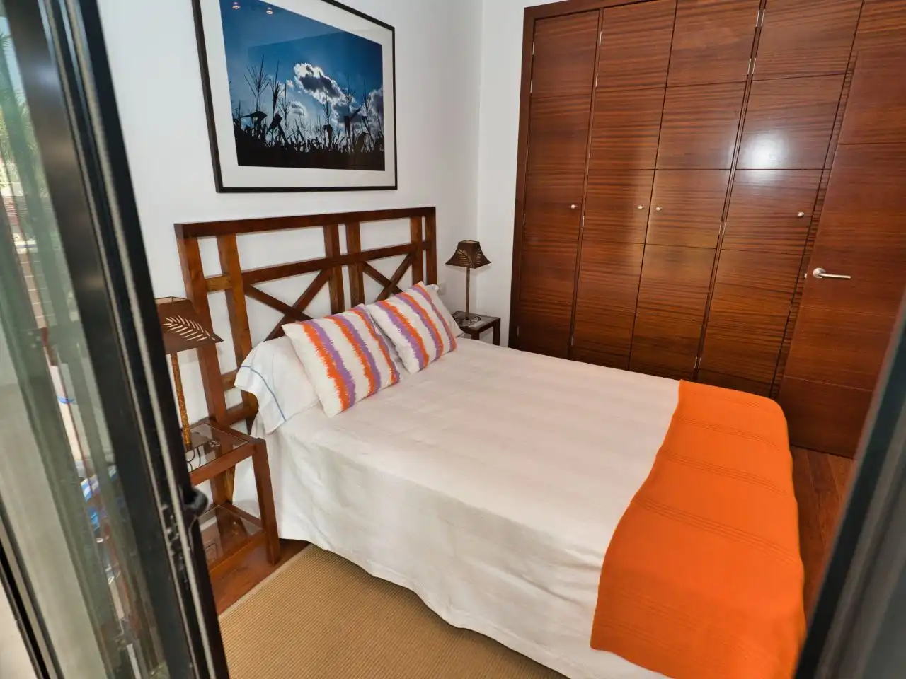 Wohnung zur Miete in Avenida Francia, 19, La Caldera Schlafzimmer von Wohnung zur Miete in Adeje mit Klimaanlage, Privatgarten und Parkett