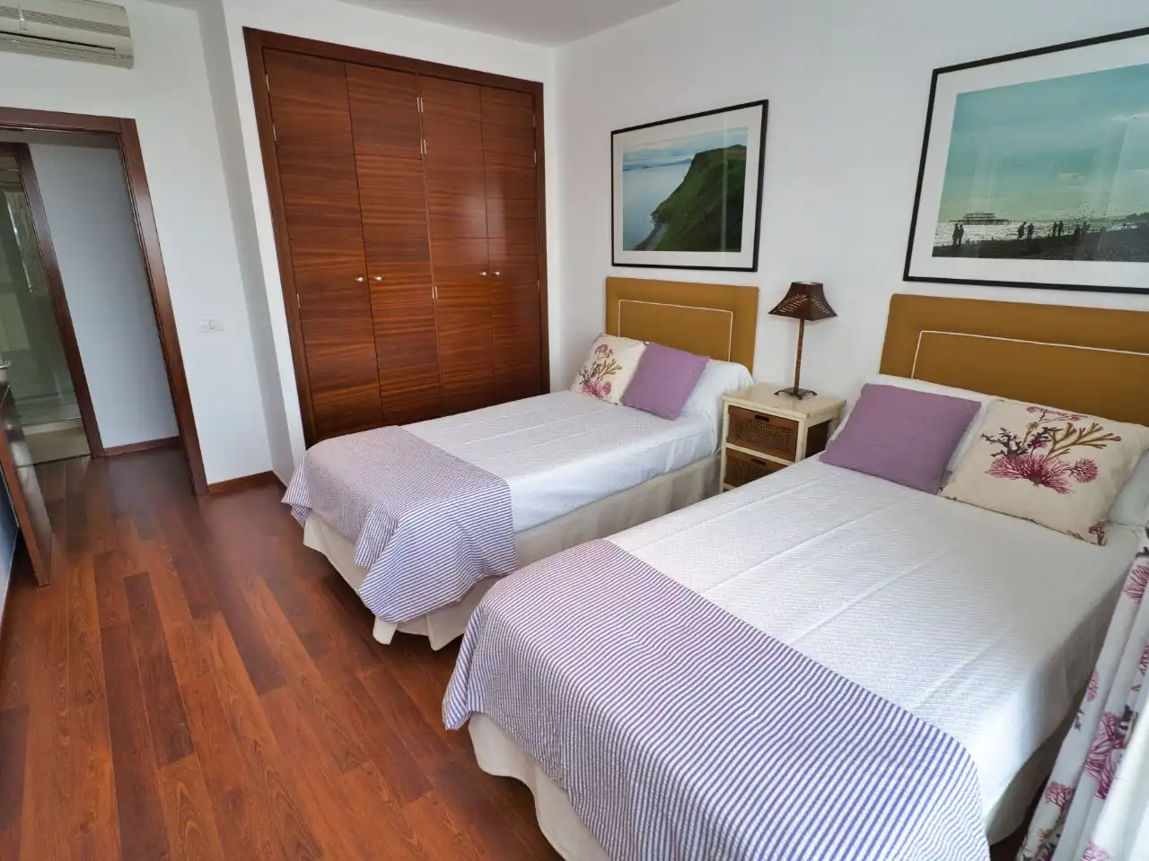 Wohnung zur Miete in Avenida Francia, 19, La Caldera Schlafzimmer von Wohnung zur Miete in Adeje mit Klimaanlage, Privatgarten und Parkett