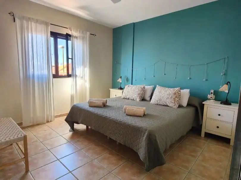 Piso en venta en Calle Guanches de la Virgen de Candelaria, 22, Cuevecitas - Malpaís Habitación de Piso en venta en Candelaria con Aire acondicionado, Jardín privado y Terraza
