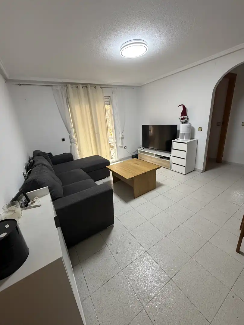 Living room of Flat for rent in Torrevieja  with Air Conditioner, Swimming Pool and Furnished