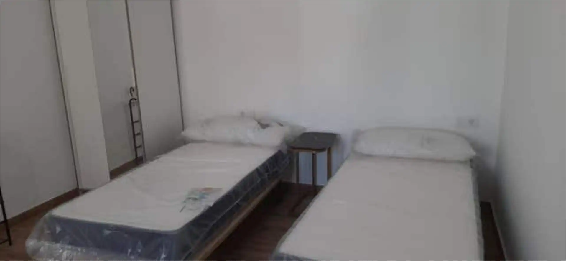 Dormitori de Apartament de lloguer en Benicasim / Benicàssim amb Jardí privat i Moblat