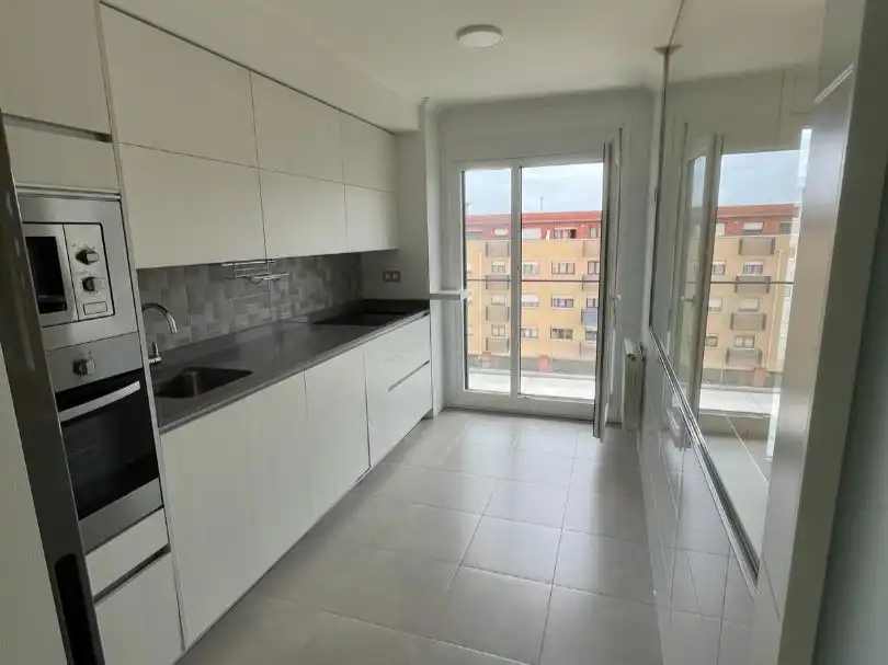 Kitchen of Flat for sale in Gijón   with Heating, Terrace and Storage room