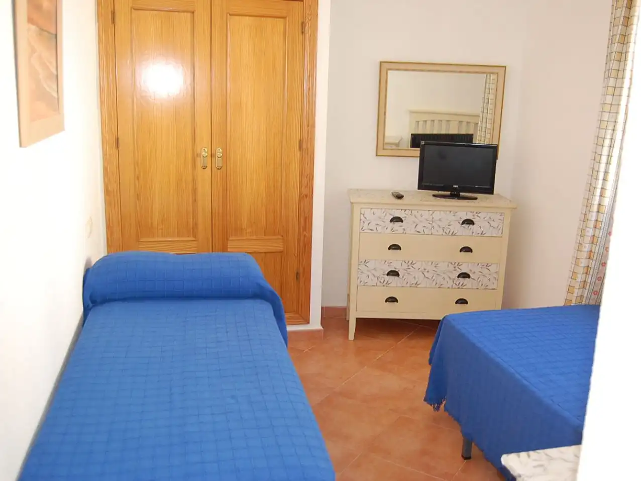Wohnung zur Miete in Calle Crustáceos, 1, Punta Umbría Schlafzimmer von Wohnung zur Miete in Punta Umbría mit Klimaanlage, Terrasse und Balkon