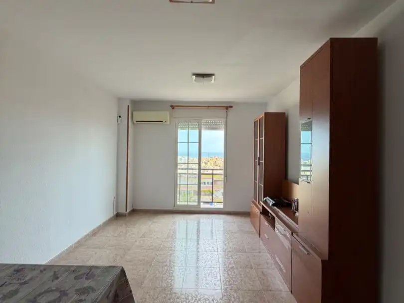 Sala d'estar de Pis en venda en Roquetas de Mar amb Aire condicionat, Piscina i Aparcament comunitari