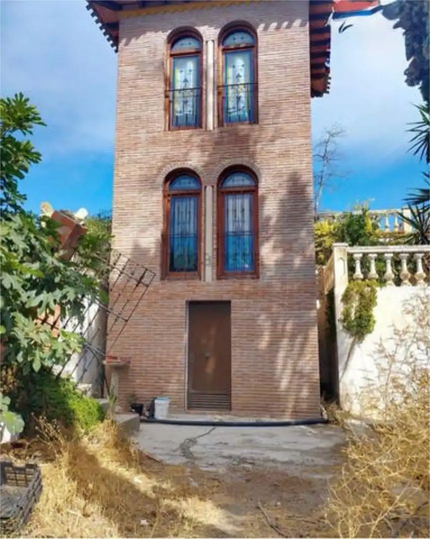 Außenansicht von Einfamilien-Reihenhaus zum Verkauf in Vélez-Málaga mit Terrasse und Schwimmbad