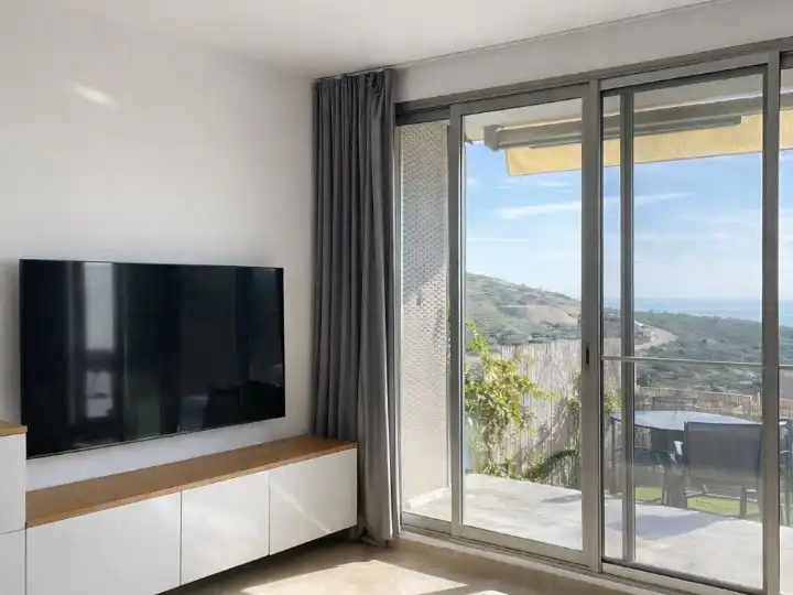 Casa adosada en venta en Calle del Pou, 40, Costa Sur Sala de estar de Casa adosada en venta en Peñíscola / Peníscola con Aire acondicionado, Calefacción y Jardín privado