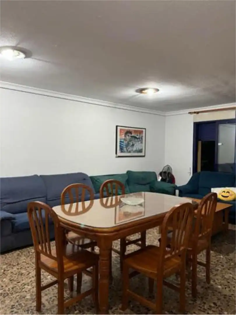 Apartamento de alquiler en Playa de Gandia Comedor de Apartamento de alquiler en Gandia con Terraza, Piscina y Amueblado