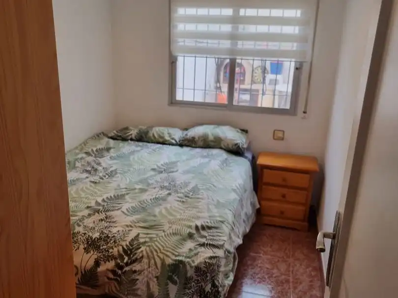Einfamilien-Reihenhaus zur Miete in Calle Río Sena, 12, Los Cuarteros Schlafzimmer von Einfamilien-Reihenhaus zur Miete in San Pedro del Pinatar mit Klimaanlage, Heizung und Privatgarten