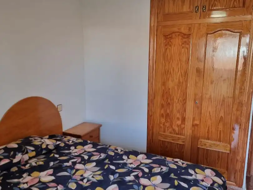 Einfamilien-Reihenhaus zur Miete in Calle Río Sena, 12, Los Cuarteros Schlafzimmer von Einfamilien-Reihenhaus zur Miete in San Pedro del Pinatar mit Klimaanlage, Heizung und Privatgarten
