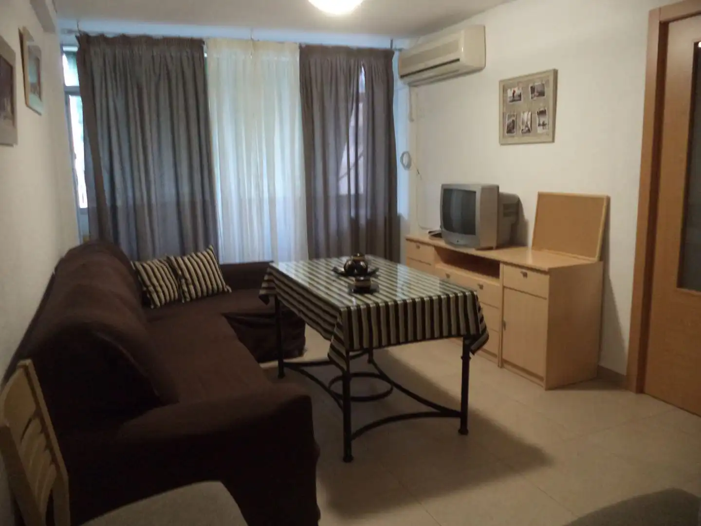 Sala de estar de Piso para compartir en Córdoba con Aire acondicionado y Amueblado