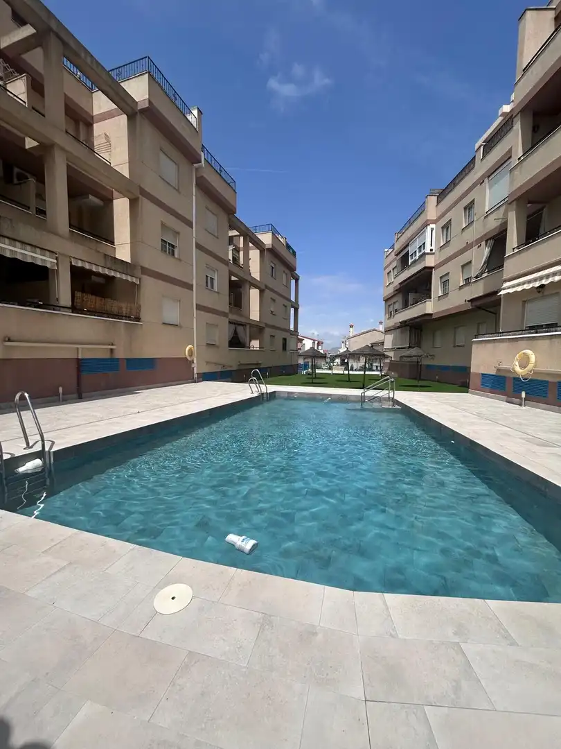 Swimming pool of Flat for sale in Las Gabias  with Parquet flooring, Terrace and Storage room