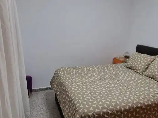 Casa adosada en venta en Calle Coroneles Lacasa, 3, Calvo Sotelo Habitación de Casa adosada en venta en Melilla con Aire acondicionado, Terraza y Amueblado
