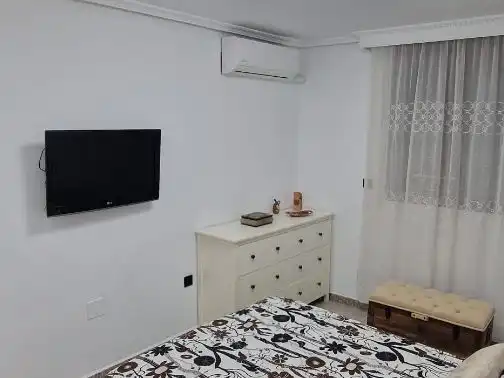 Casa adosada en venta en Calle Coroneles Lacasa, 3, Calvo Sotelo Habitación de Casa adosada en venta en Melilla con Aire acondicionado, Terraza y Amueblado