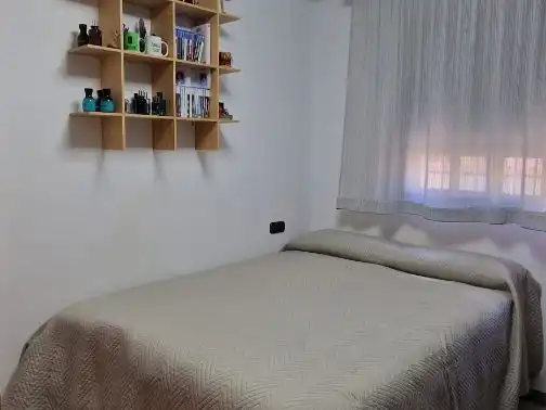 Casa adosada en venta en Calle Coroneles Lacasa, 3, Calvo Sotelo Habitación de Casa adosada en venta en Melilla con Aire acondicionado, Terraza y Amueblado
