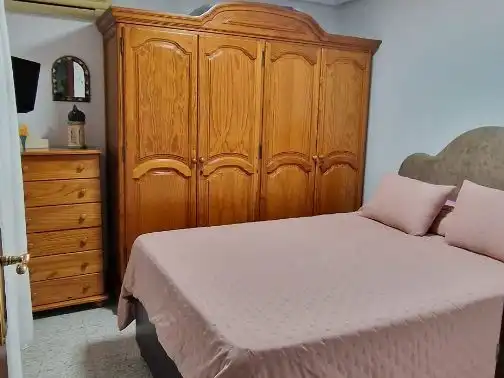 Casa adosada en venta en Calle Coroneles Lacasa, 3, Calvo Sotelo Habitación de Casa adosada en venta en Melilla con Aire acondicionado, Terraza y Amueblado