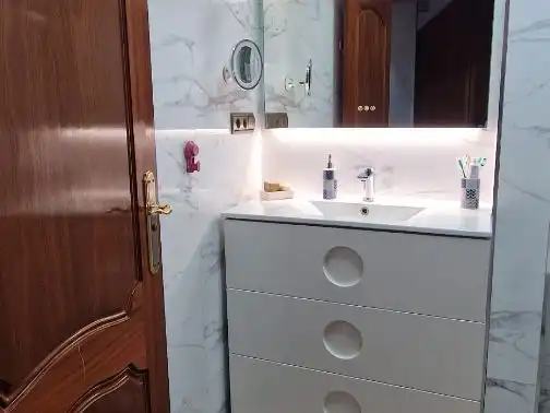 Casa adosada en venta en Calle Coroneles Lacasa, 3, Calvo Sotelo Baño de Casa adosada en venta en Melilla con Aire acondicionado, Terraza y Amueblado