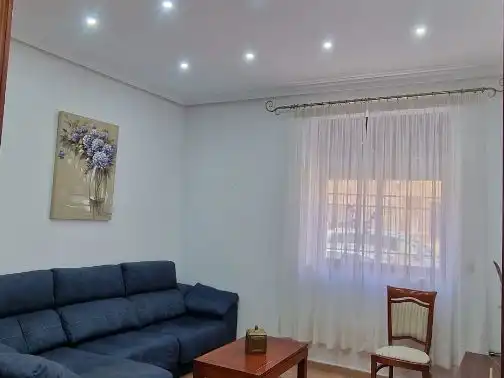 Casa adosada en venta en Calle Coroneles Lacasa, 3, Calvo Sotelo Sala de estar de Casa adosada en venta en Melilla con Aire acondicionado, Terraza y Amueblado