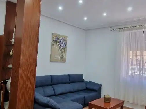 Casa adosada en venta en Calle Coroneles Lacasa, 3, Calvo Sotelo Sala de estar de Casa adosada en venta en Melilla con Aire acondicionado, Terraza y Amueblado