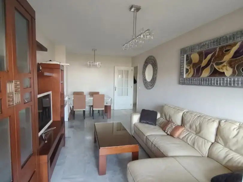 Wohnung zum Verkauf in Calle Hermes, 10, El Cónsul - Ciudad Universitaria - El Romeral Wohnzimmer von Wohnung zum Verkauf in Málaga Capital mit Klimaanlage, Schwimmbad und Balkon